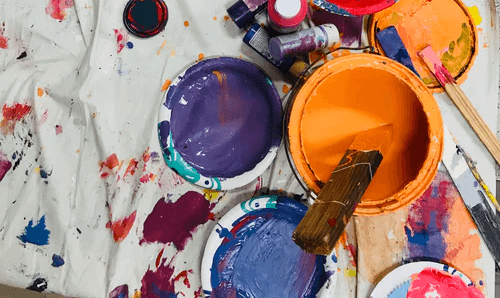 buckets of different colour paints